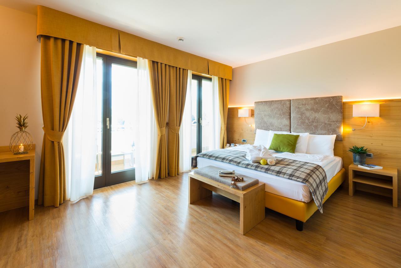 Hotel Ambassador Levico Terme Bagian luar foto